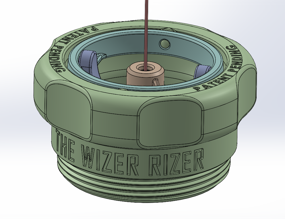 The Wizer Rizer housing engraved with its name, laser projecting straight up through the center